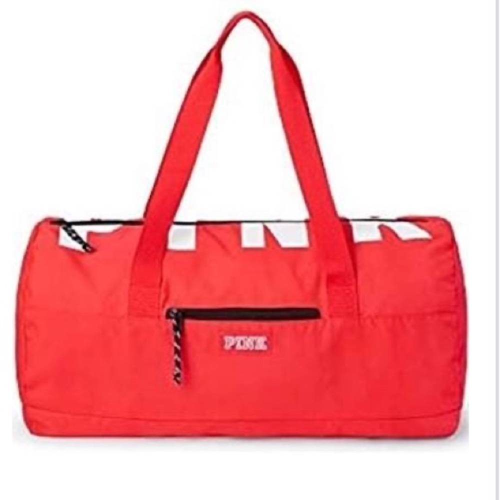 Victoria’s Secret neon orange duffel bag